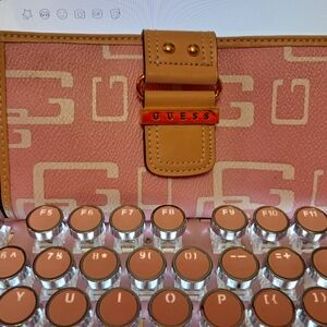 Guess Pink and Tan Logo Clutch